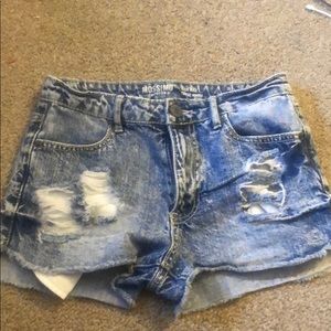 Blue ripped shorts